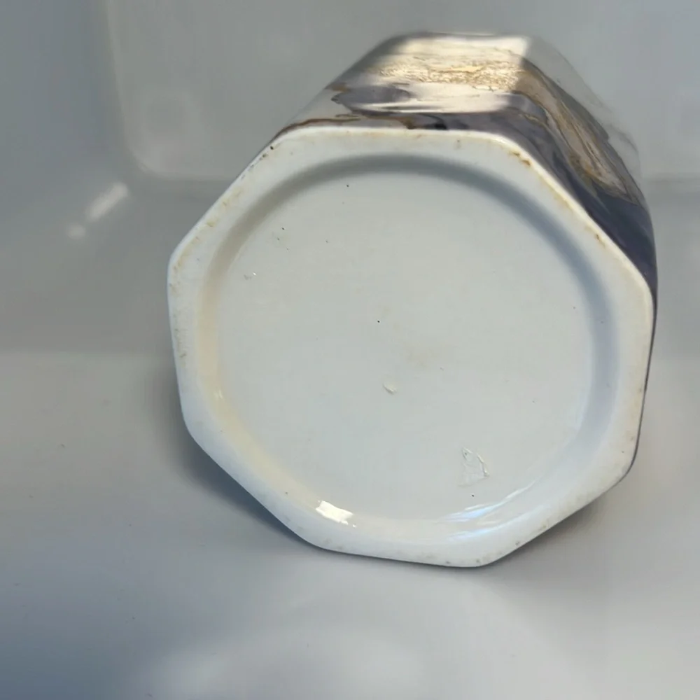 Ceramic cup, purple, gold, white.